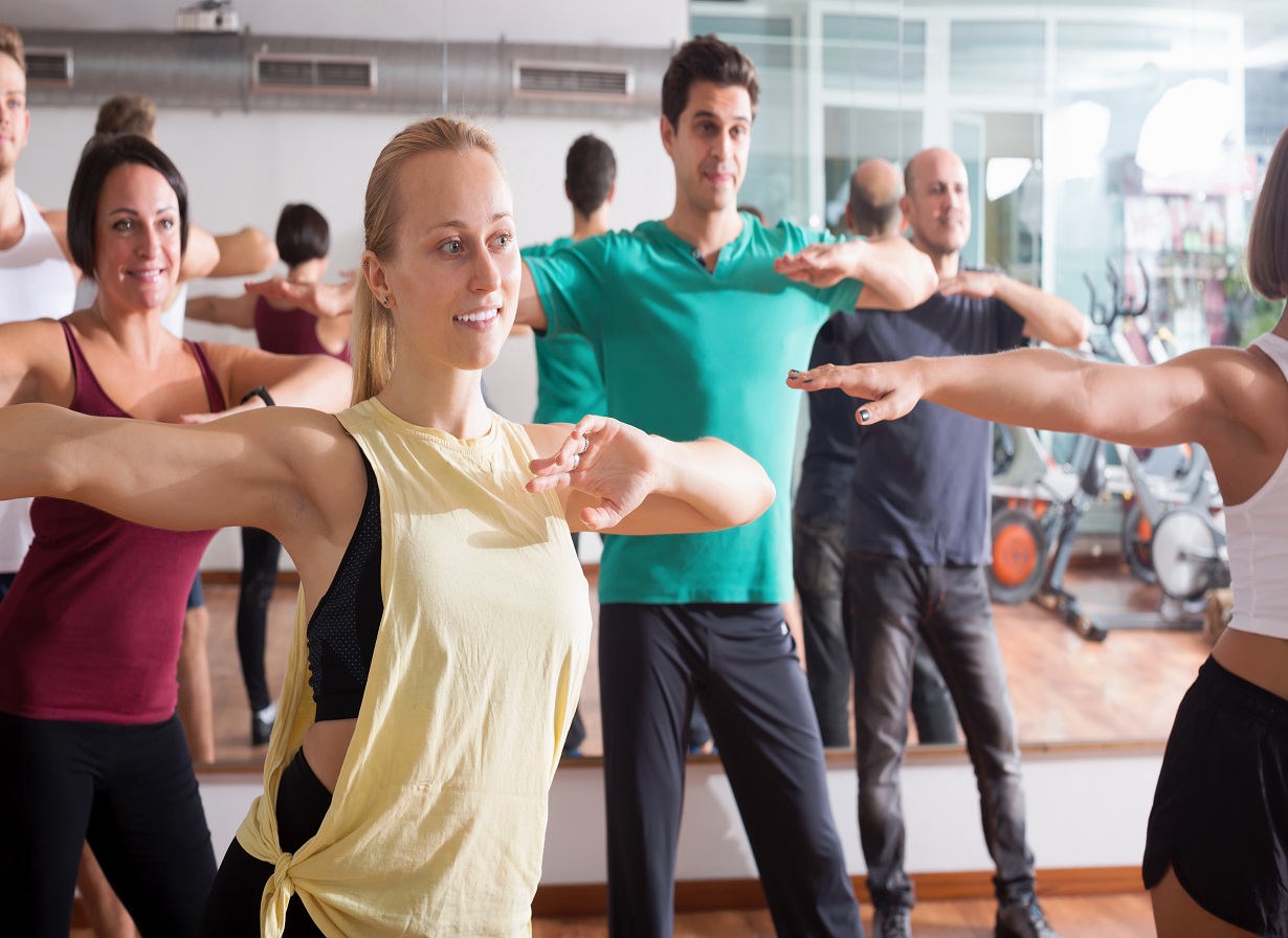 Young,Happy,People,Studying,Zumba,Elements,In,Dancing,Hall