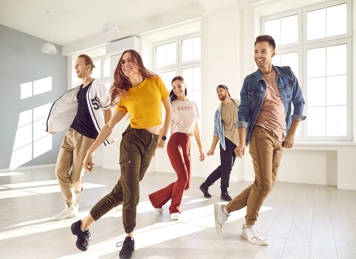 Group,Of,Happy,Beautiful,Young,People,Enjoying,A,Contemporary,Dancing